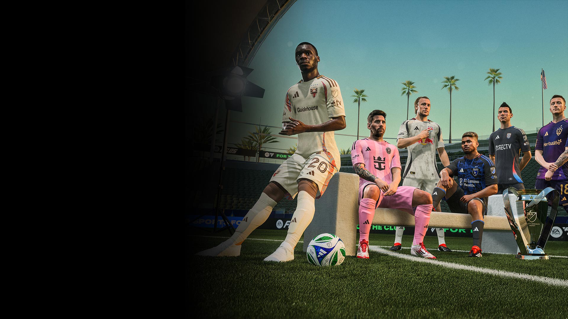 Five players in different jerseys gathered around a bench on a soccer field.